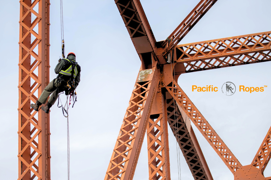 rope technician working at height on bridge